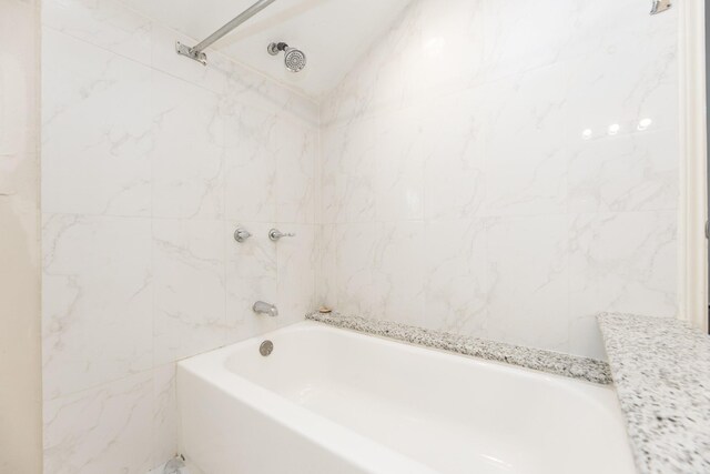 2023 Gentryside Dr Unit 508, Houston, TX 77077 - bathroom featuring a tub and a shower
