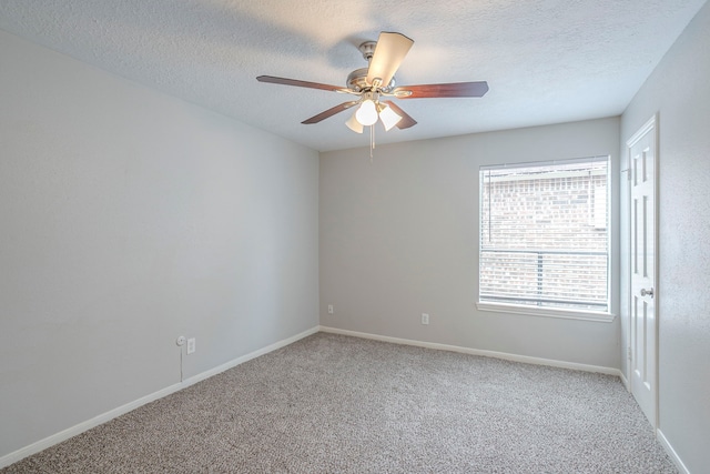 5893 Southern Hills Dr, Houston, TX 77069 - carpeted empty room featuring baseboards, a textured ceiling, and ceiling fan