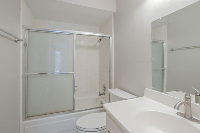 5893 Southern Hills Dr, Houston, TX 77069 - bathroom with shower / bath combination with glass door, toilet, and vanity
