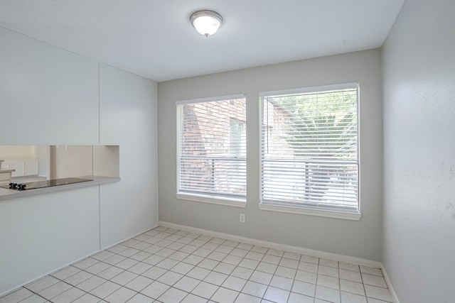 5893 Southern Hills Dr, Houston, TX 77069 - unfurnished dining area featuring plenty of natural light and baseboards