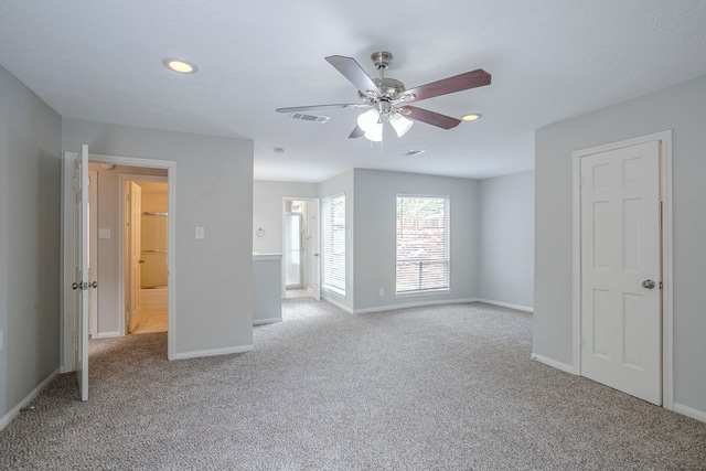 5893 Southern Hills Dr, Houston, TX 77069 - unfurnished room featuring ceiling fan, baseboards, visible vents, and light colored carpet