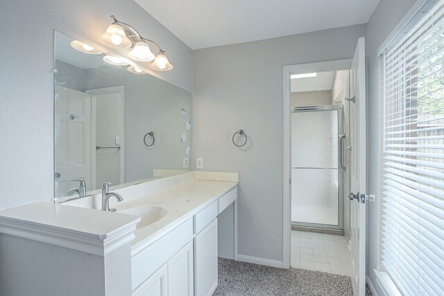 5893 Southern Hills Dr, Houston, TX 77069 - full bathroom featuring baseboards, vanity, and a stall shower