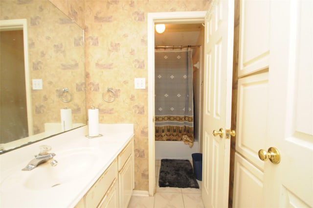 2631 Plantation Hollow Ct, Missouri City, TX 77459 - bathroom featuring wallpapered walls, vanity, and tile patterned flooring