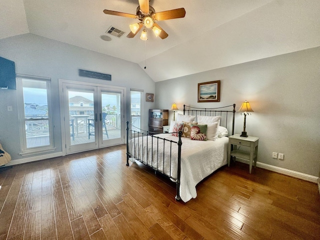bedroom with access to outside, vaulted ceiling, baseboards, wood finished floors, and french doors