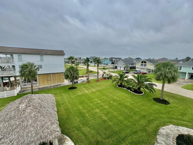 view of yard featuring a residential view
