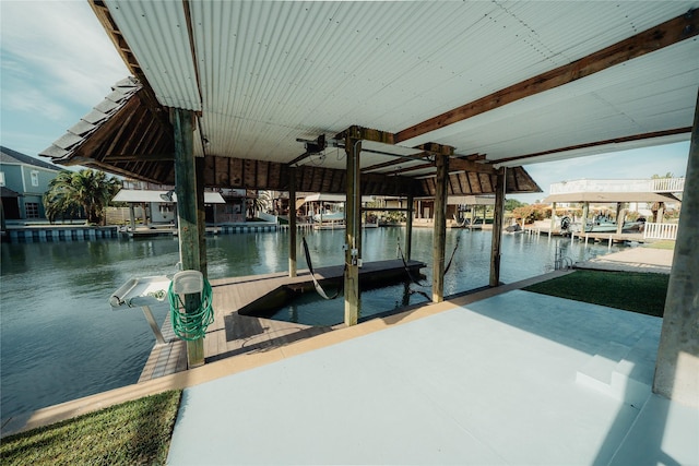 dock with a water view and boat lift