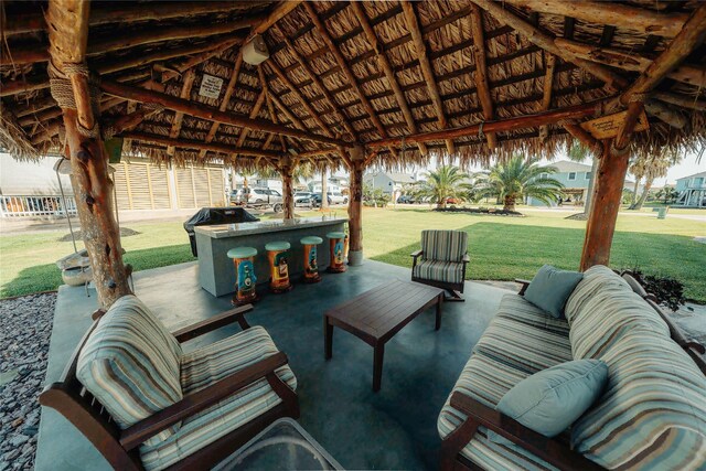 1314 Hawaii Dr, Tiki Island, TX 77554 - view of patio with a gazebo and an outdoor hangout area