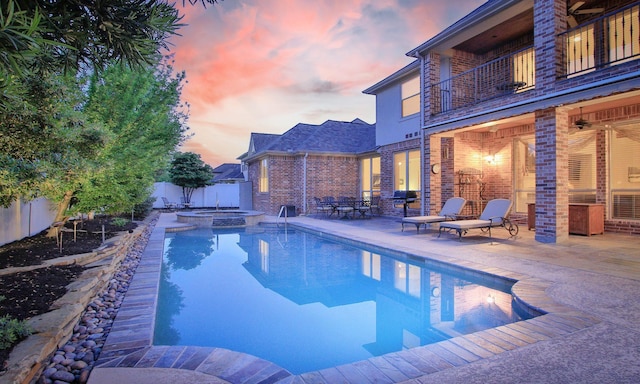 14622 Lindale Rose Ln, Humble, TX 77396 - view of swimming pool with a patio area, a fenced backyard, and a pool with connected hot tub