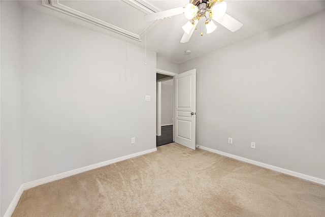 2634 Couch St, Houston, TX 77008 - unfurnished room with attic access, ceiling fan, baseboards, and light carpet