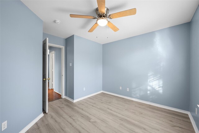 16854 Carrollton Creek Ln, Houston, TX 77084 - unfurnished room featuring baseboards, a ceiling fan, and wood finished floors