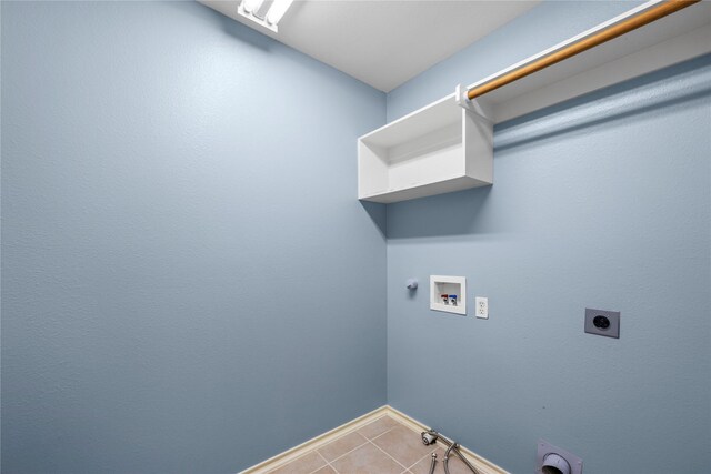 16854 Carrollton Creek Ln, Houston, TX 77084 - laundry room featuring hookup for an electric dryer, baseboards, washer hookup, hookup for a gas dryer, and laundry area