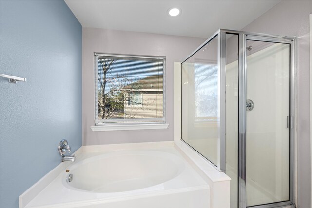 16854 Carrollton Creek Ln, Houston, TX 77084 - bathroom with a bath and a stall shower