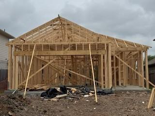142 Kelly St, Angleton, TX 77515 - miscellaneous room with vaulted ceiling