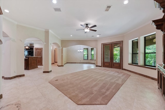 41411 Roundup Rd, Magnolia, TX 77354 - entrance foyer featuring crown molding, recessed lighting, arched walkways, and ceiling fan