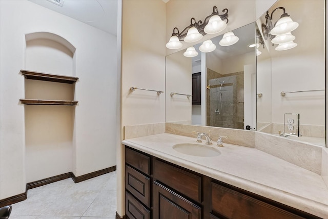 41411 Roundup Rd, Magnolia, TX 77354 - full bath with tile patterned floors, baseboards, a shower stall, and vanity