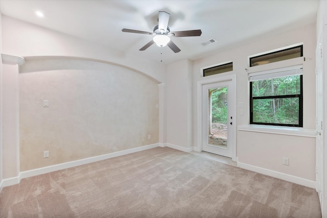 41411 Roundup Rd, Magnolia, TX 77354 - spare room with visible vents, ceiling fan, carpet flooring, and baseboards