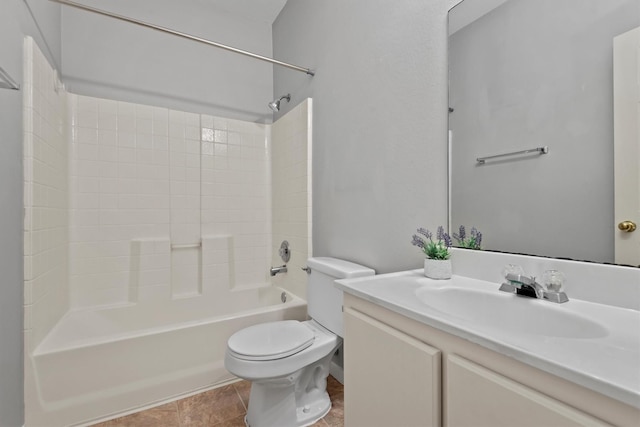 bathroom featuring toilet, vanity, and  shower combination