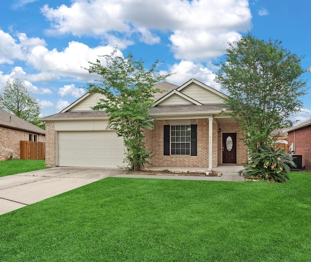 ranch-style home featuring concrete driveway, fence, a garage, brick siding, and a front yard