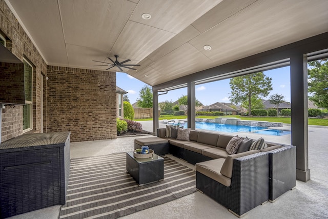 view of patio with a ceiling fan, an outdoor hangout area, and an outdoor pool