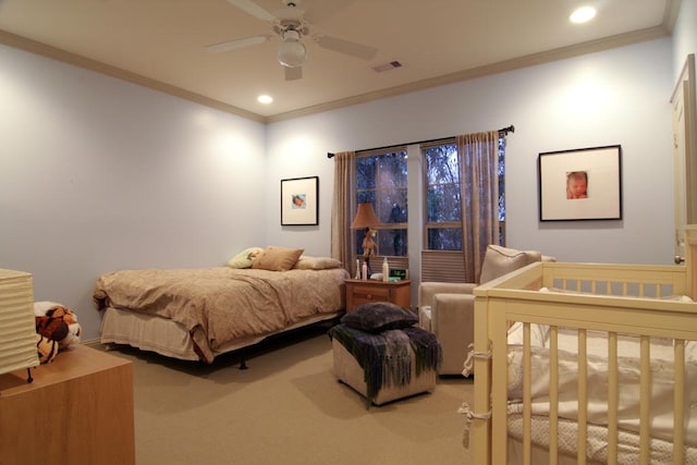 234 Detering St, Houston, TX 77007 - carpeted bedroom featuring ornamental molding, recessed lighting, and a ceiling fan