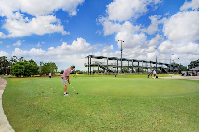 view of property's community featuring view of golf course