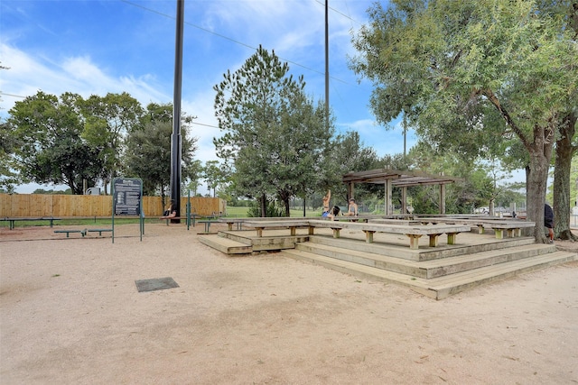 view of property's community with fence