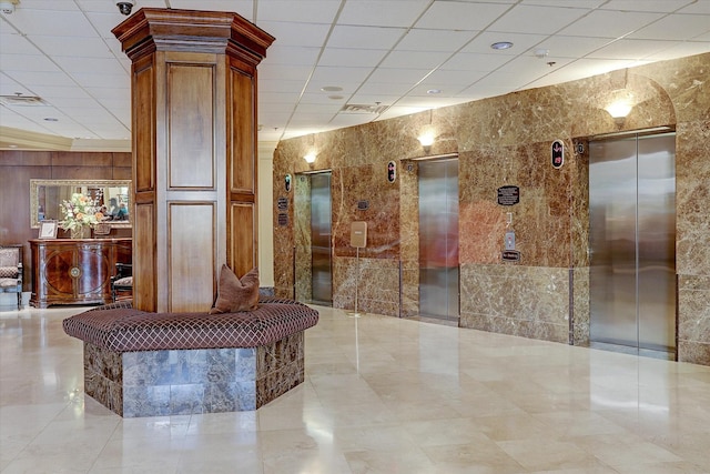 building lobby featuring visible vents