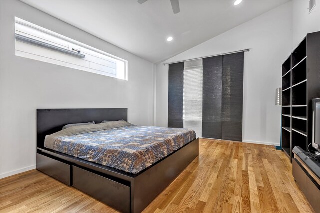 bedroom with recessed lighting, a ceiling fan, vaulted ceiling, and light wood finished floors