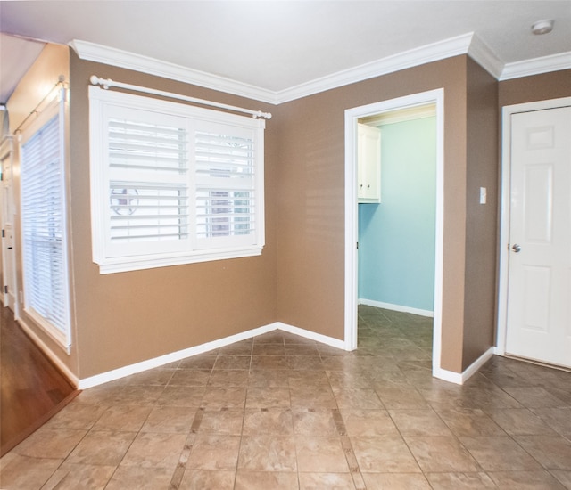234 Fantasy Ln, Montgomery, TX 77356 - spare room featuring ornamental molding and a smoke detector