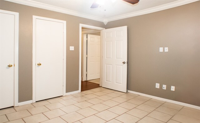 234 Fantasy Ln, Montgomery, TX 77356 - unfurnished bedroom featuring crown molding, ceiling fan, and light tile patterned floors