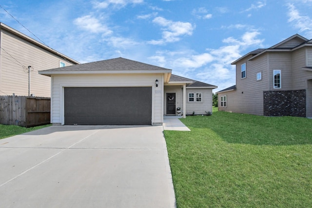 view of front facade featuring fence, a front yard, a shingled roof, an attached garage, and driveway