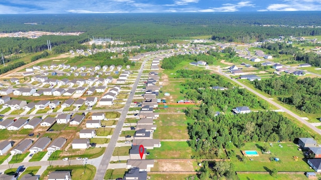 aerial view featuring a forest view