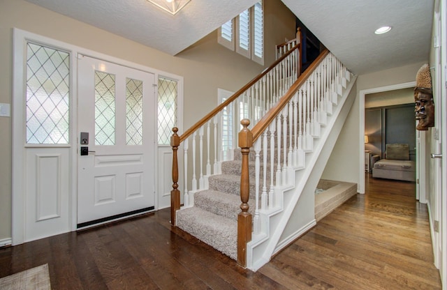 6711 Pebble Beach Dr, Houston, TX 77069 - foyer entrance featuring wood finished floors, stairway, and recessed lighting