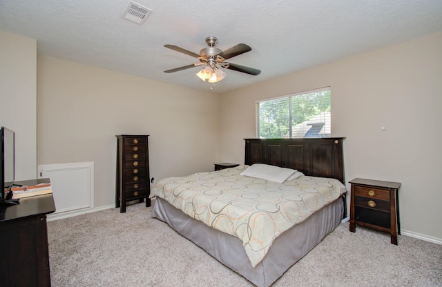 6711 Pebble Beach Dr, Houston, TX 77069 - carpeted bedroom with baseboards and a ceiling fan