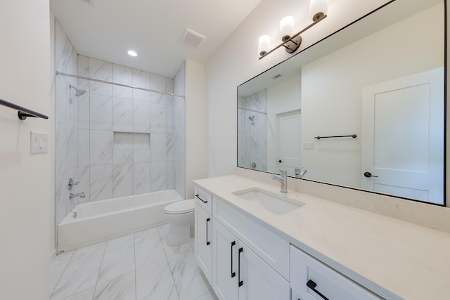 bathroom featuring marble finish floor, visible vents, toilet, vanity, and shower / tub combination