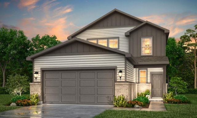 16899 Needlepoint Dr, Conroe, TX 77302 - view of front of property featuring brick siding, concrete driveway, and board and batten siding