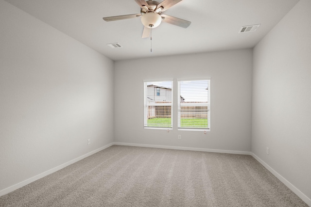 16899 Needlepoint Dr, Conroe, TX 77302 - spare room with light colored carpet and ceiling fan