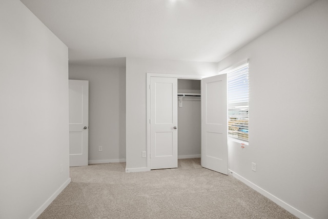 16899 Needlepoint Dr, Conroe, TX 77302 - unfurnished bedroom featuring carpet floors and a closet