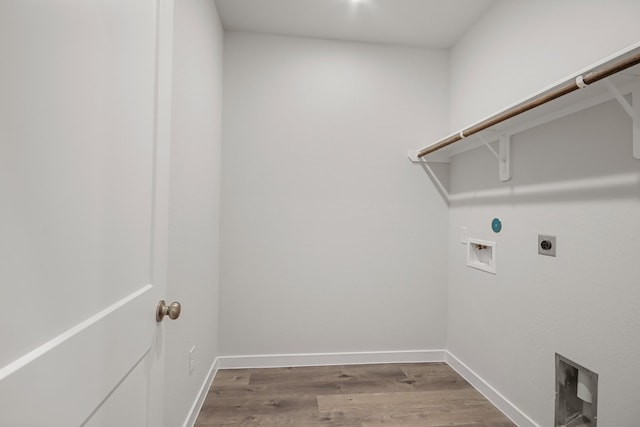 16899 Needlepoint Dr, Conroe, TX 77302 - washroom with hookup for an electric dryer, washer hookup, and wood finished floors