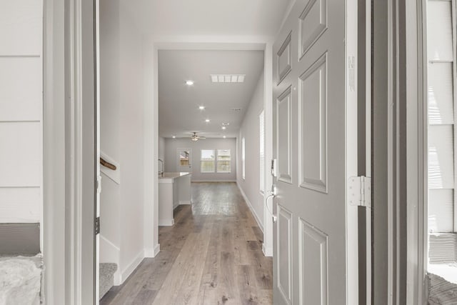16899 Needlepoint Dr, Conroe, TX 77302 - foyer entrance with light wood finished floors and ceiling fan