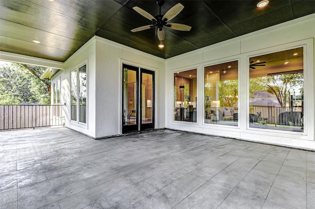 exterior space featuring ceiling fan and a wooden deck
