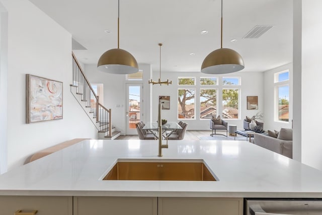 3826 Wilmer St, Houston, TX 77003 - kitchen featuring visible vents, pendant lighting, open floor plan, recessed lighting, and light countertops