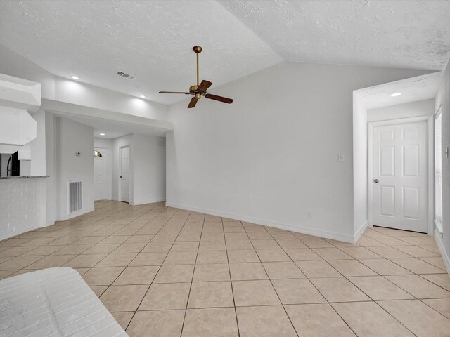403 Elder Vista Dr, Houston, TX 77598 - unfurnished living room with ceiling fan, light tile patterned flooring, a textured ceiling, and visible vents