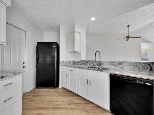 403 Elder Vista Dr, Houston, TX 77598 - kitchen with a sink, a textured ceiling, white cabinetry, ceiling fan, and black appliances