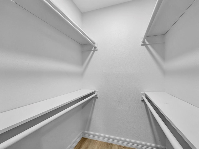 403 Elder Vista Dr, Houston, TX 77598 - walk in closet featuring light wood-style floors