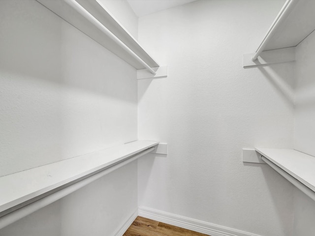 403 Elder Vista Dr, Houston, TX 77598 - walk in closet featuring wood finished floors