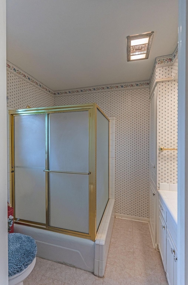 1345 10th St, Hempstead, TX 77445 - full bathroom with wallpapered walls, tile patterned flooring, and a shower with shower door