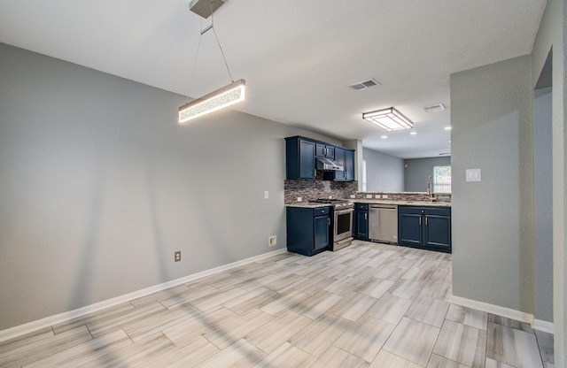 5823 Plantation Crest Dr, Katy, TX 77449 - kitchen with a sink, stainless steel appliances, light countertops, backsplash, and visible vents