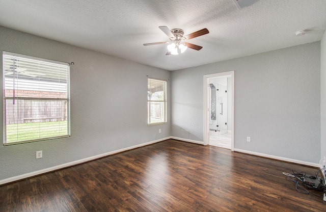 5823 Plantation Crest Dr, Katy, TX 77449 - empty room with wood finished floors, baseboards, a textured ceiling, and ceiling fan