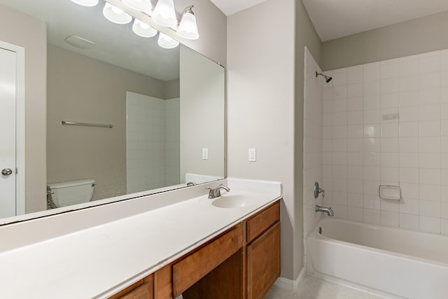 bathroom with toilet, shower / bathtub combination, and vanity